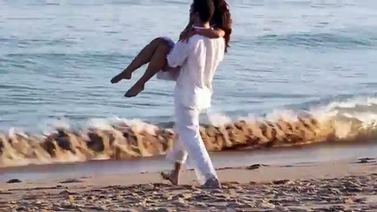 Couple in Love playing with water and dancing...