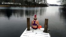 Swimmer braves icy-cold waters of Lake Windermere