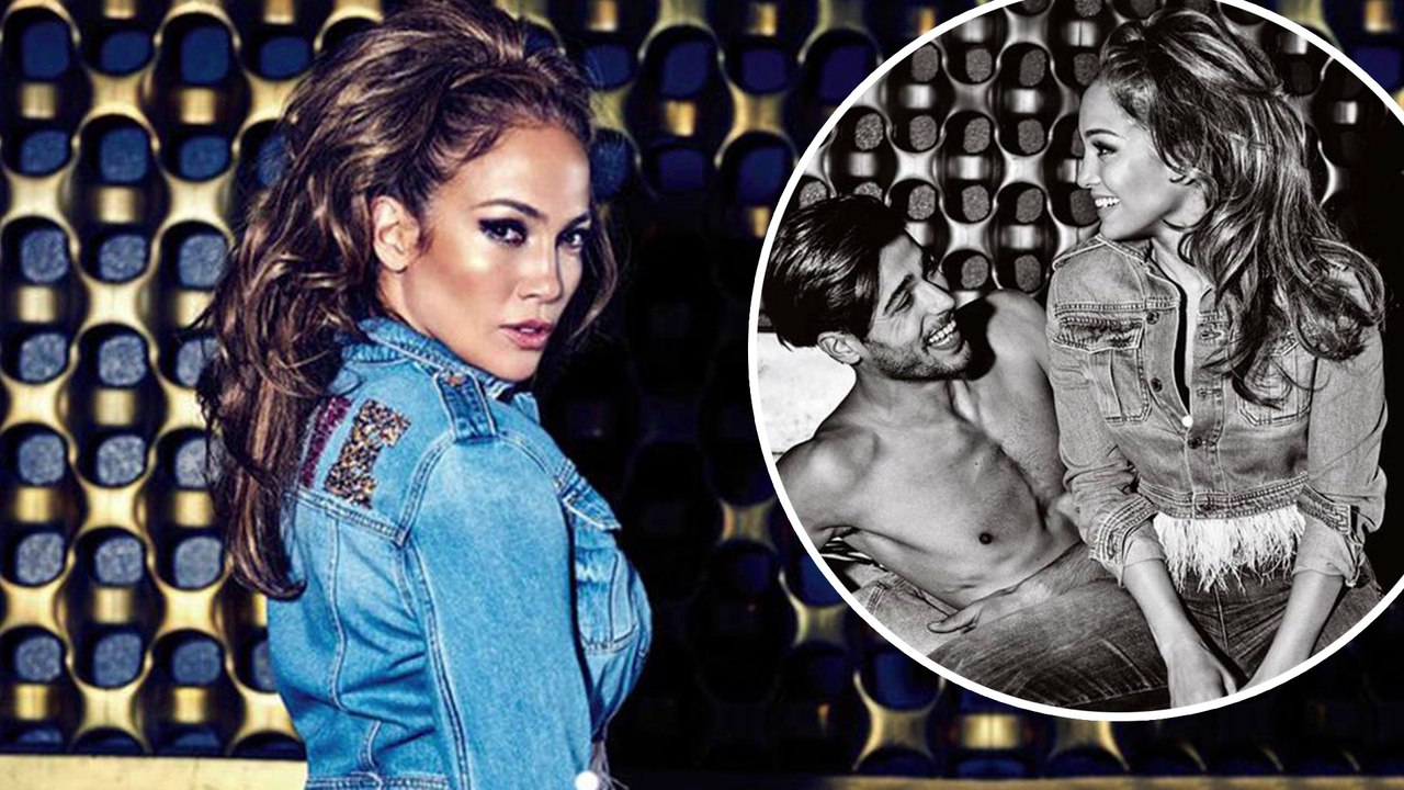 Look away Alex Rodriguez! Jennifer Lopez cuddles up to shirtless young male model in hot new Guess advertisement.