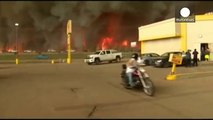 Oil workers evacuated as Fort McMurray wildfire spreads rapidly north