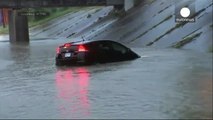 TV reporter saves driver sinking in Texas floodwaters