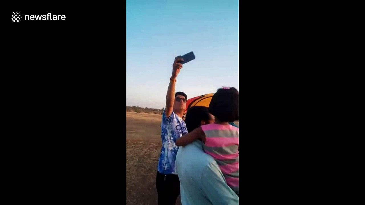 Terrifying moment tandem paragliding crashes