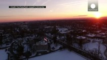 Drone footage: Snow blankets New York landmarks & Philadelphia at sunrise