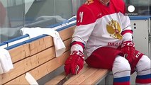 Putin gets his skates on for ice hockey training, Russia