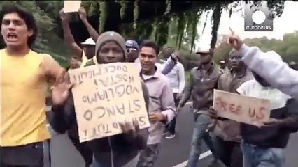 Migrants: scuffles with police as hundreds march in Milan