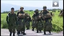 Japan cabinet approves draft laws to expand military role