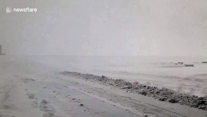 Snow turns closed Glasgow Airport into barren wasteland