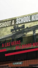 A Las Vegas billboard was found vandalized Thursday morning with "Shoot a Kid" message