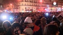 Tens of thousands hold a vigil for the victims of the Paris terror attack
