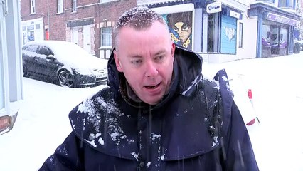 Sledgers take to the streets of Exeter as snowstorm hits