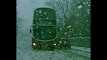 This is the terrifying moment a bus narrowly avoids crashing into an out-of-control on an icy road.