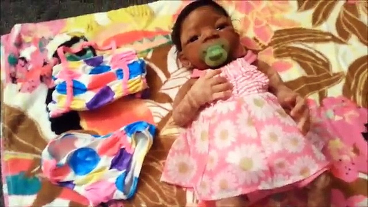 Silicone Baby Goes Swimming for the First Time!