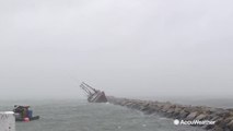 Watch boat nearly tip over in heavy winds as bomb cyclone pounds Massachusetts