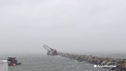 Watch boat nearly tip over in heavy winds as bomb cyclone pounds Massachusetts