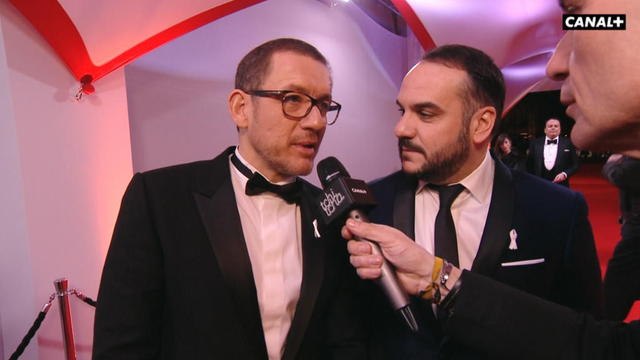 Dany Boon et François-Xavier Demaison C'est important de porter ce ruban pour dire qu'on est contre les violences faites aux Femmes - César 2018