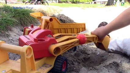 Toy Truck Videos for kids- fisher price classic trucks and dog digging in the sand