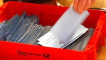 SPD members vote for coalition with Merkel's conservatives - German media