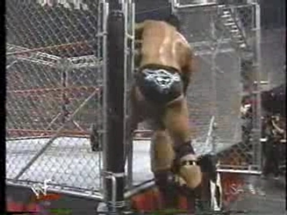 the rock vs triple h (steel cage match)