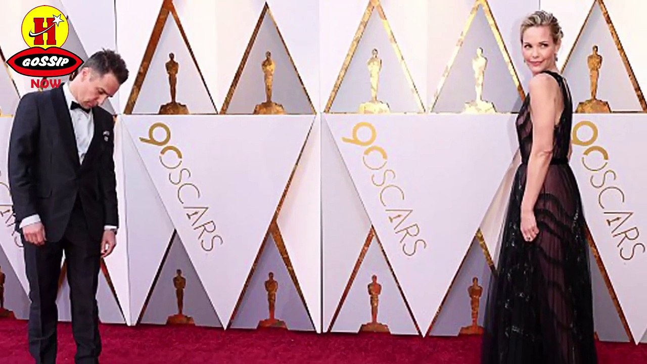 Sam Rockwell packs on the PDA with girlfriend Leslie Bibb at the Oscars