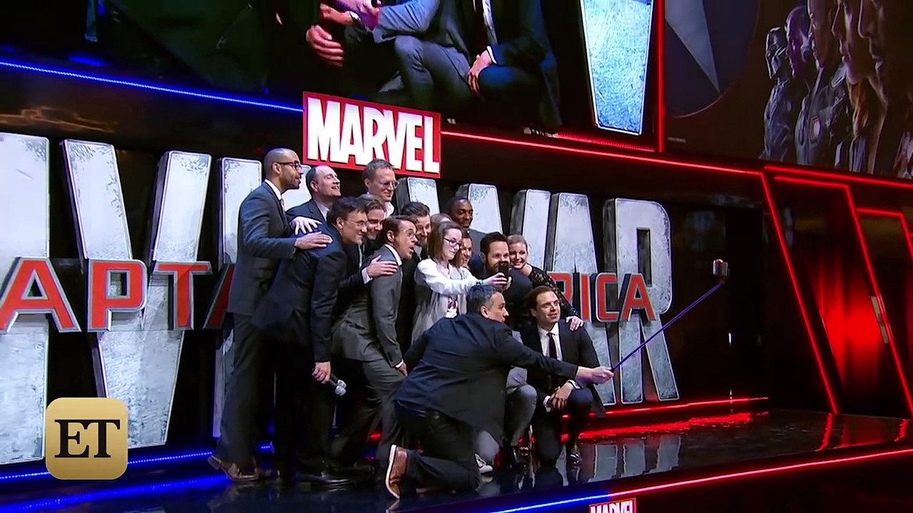 Chris Evans Can't Keep His Eyes Off Elizabeth Olsen's Chest at 'Captain America_ Civil War' Premi…