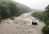 River Breaks Its Banks on Reunion Island as Tropical Cyclone Dumazile Hits