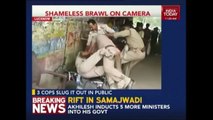 Policemen Fighting Over Sharing Bribe Money Caught On Camera