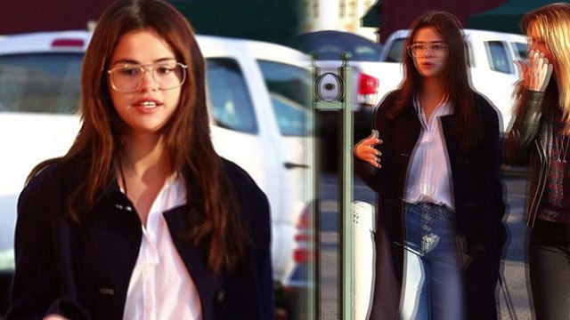 Making a spec-tacle! Selena Gomez rocks chic winter coat and oversized reading glasses during dinner date with gal pal... before heading to church service with Justin Bieber.