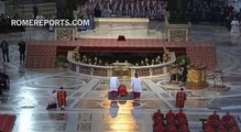 Pope Francis prays face down, on the floor of St. Peter\'s Basilica