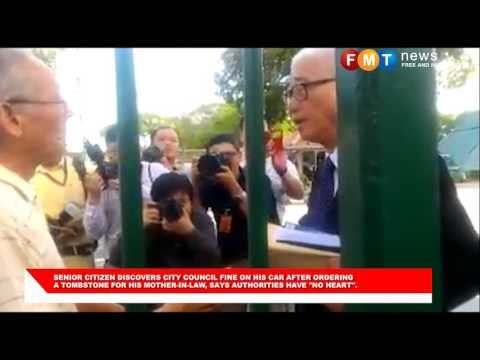 Man berates Penang exco over parking fine