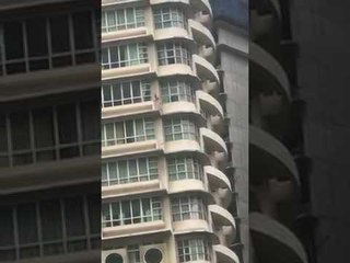 Naked man rescued from ledge of KL high-rise