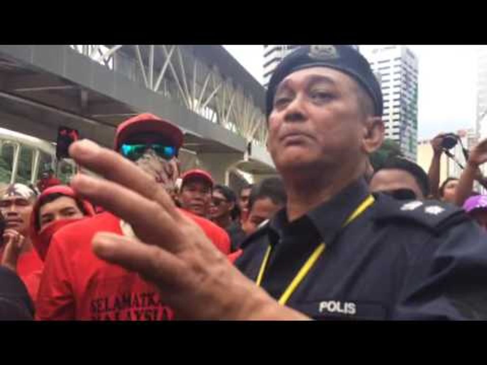 Police trying to calm down the red shirts