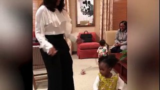 Michelle Obama's dance with her 2-year-old admirer of her portrait
