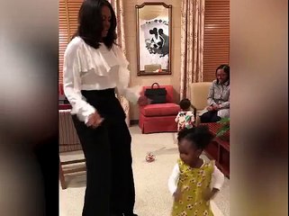 Michelle Obama's dance with her 2-year-old admirer of her portrait