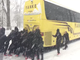 PUSH! Northeastern women's basketball team fixes stuck bus in snowstorm - ABC15 Digital