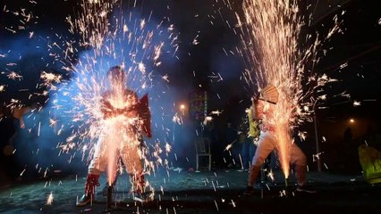 Chinese villagers 'eat' sparks to ring in Year of the Dog