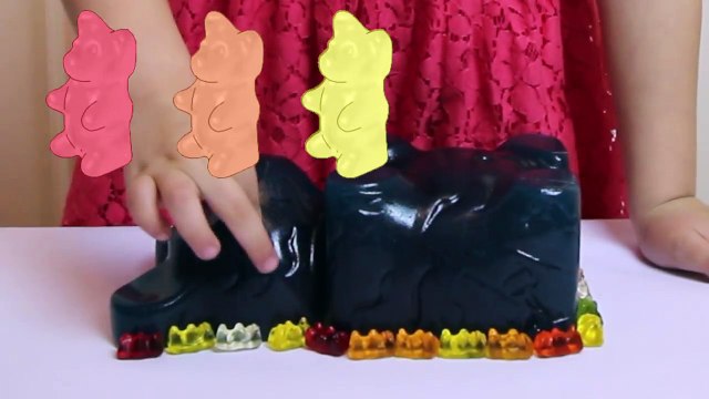 WORLDS LARGEST GUMMY BEAR!!! Giant Gummy Bear take a candy Jelly bath