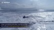 Spectacular drone footage captures surf and jetski wipeout in Portugal