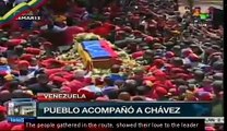 Thousands of Venezuelans march alongside Hugo Chávez