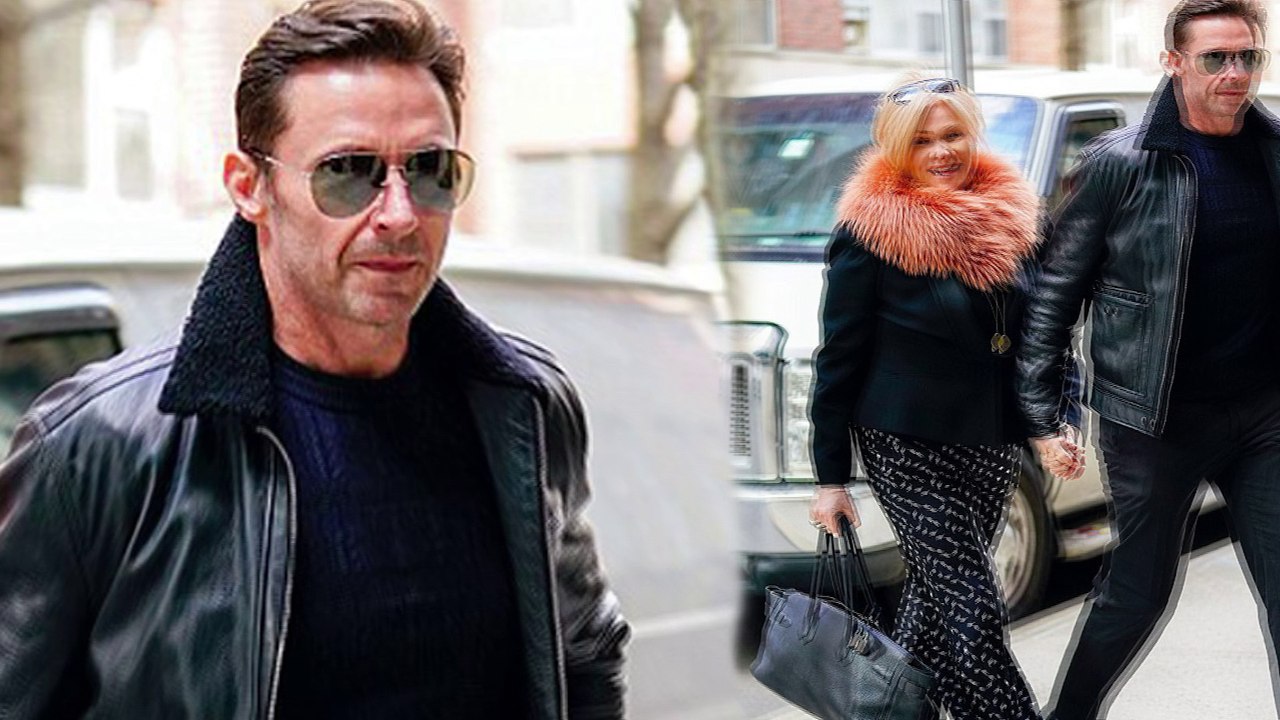 Still so in love! Besotted Hugh Jackman and wife Deborra-lee hold hands while out and about in New York City.