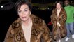 Kris Jenner, 62, commands attention in $55,526 mink coat as she makes a rare public appearance with boyfriend Corey Gamble, 37... amid claims the couple are close to splitting.