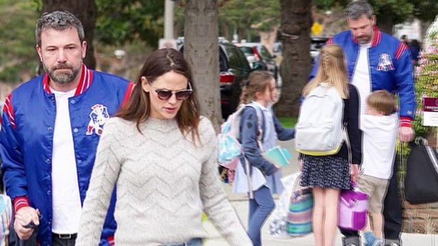 United front! Jennifer Garner and ex Ben Affleck pick up their three kids from school in Los Angeles.