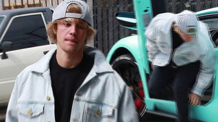 Justin-Bieber-models-denim-jacket-as-hesteps-out-of-eye-popping-turquoise-Lamborghini-in-Los-Angeles