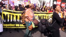 Women walk through London streets to protest against violence