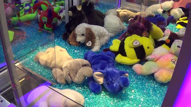 Claw Machine Adventures: Playing Disneys Rigged Claw Machines!