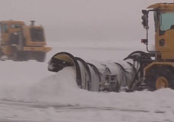 Iowa Air Guard Works to Clear Ground After More Snow Falls in Sioux City Area