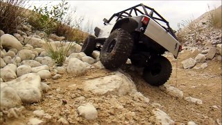 Trail run through rocks, stone and gravel, mud and water. Scx10 Jeep Wrangler rubicon!