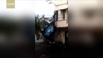Internet cafe in Indonesia collapses after torrential rain