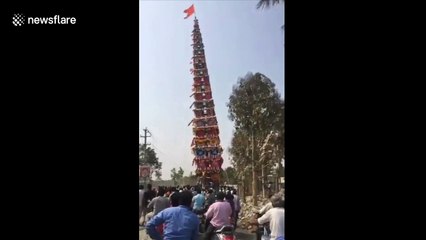 Terrifying moment 100-foot chariot falls on power lines