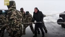 Passengers rescued from van sinking in frozen lake