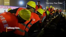 Incredible manpower: 1,500 workers build railway station in NINE hours in China